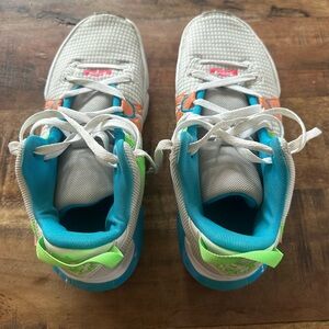 Nike White and Blue Athletic Shoes with Orange Accents